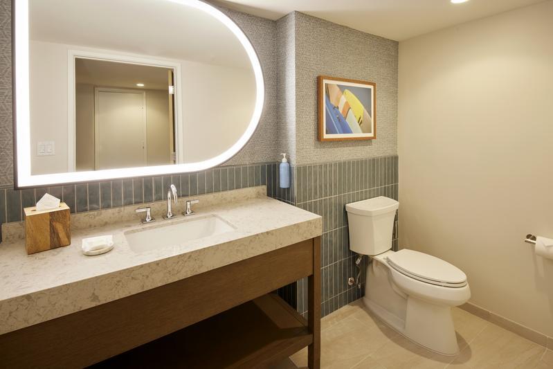 HHV_K1SLQ1_Rainbow-Renovated-Suite-Living-Area-Bathroom.jpg